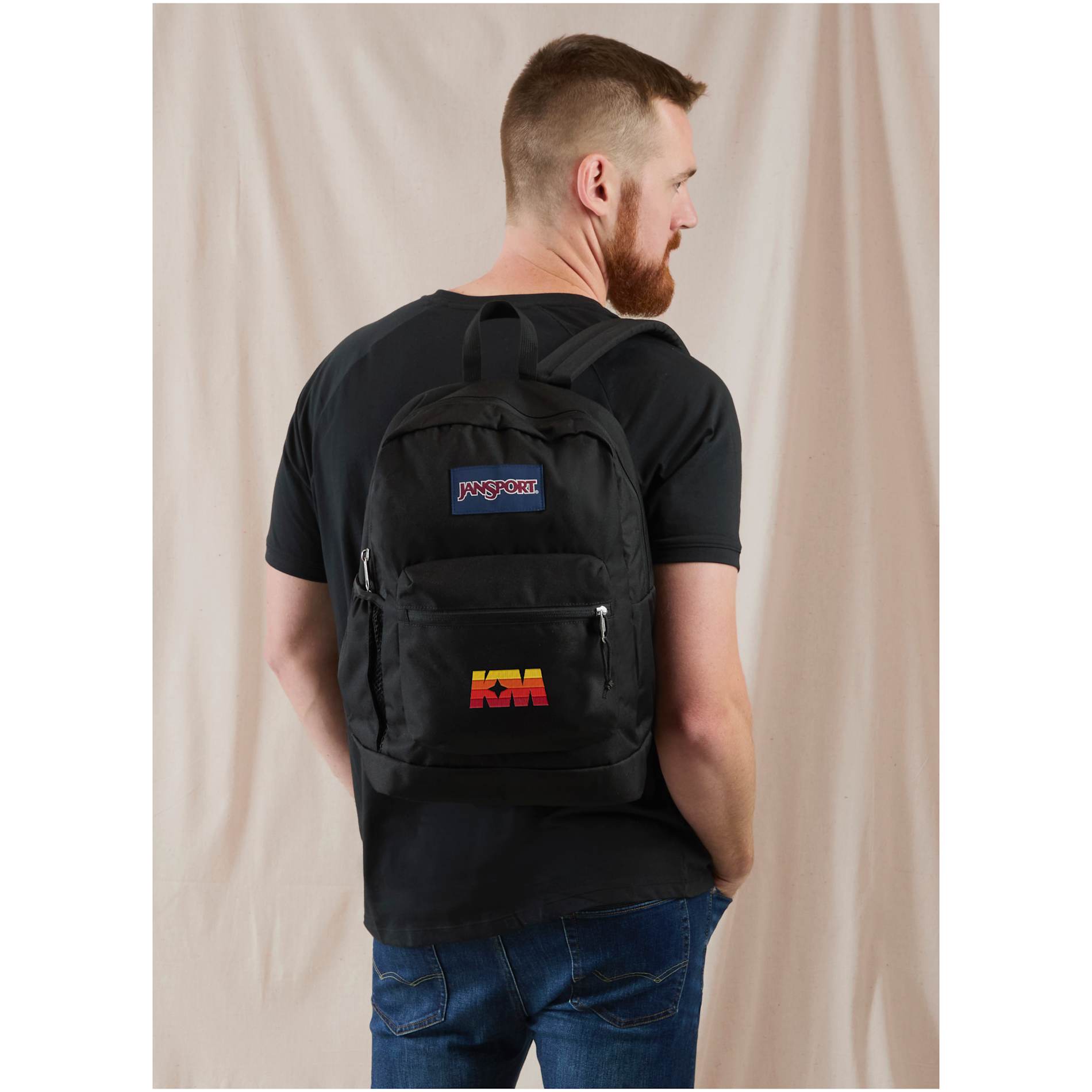 Front View of Black Jansport Crosstown Plus Backpack
